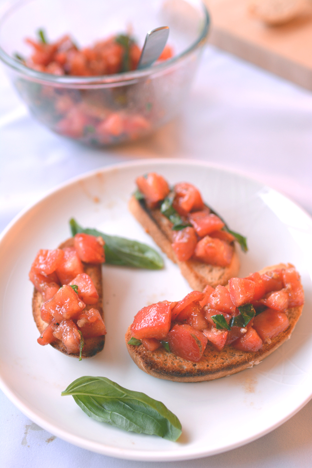 Homemade bruschetta with tomatoes and basil.