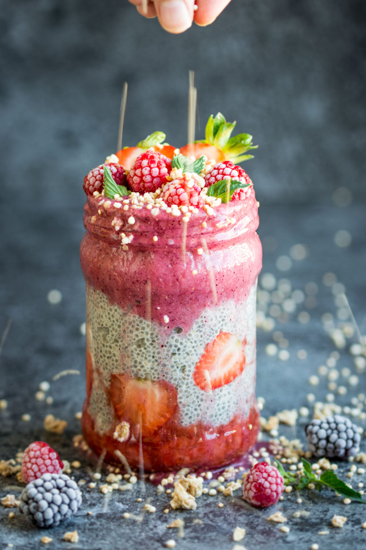 Berry Layered Chia Pudding. Chia seeds transform into a delicious pudding-like texture when soaked in liquid. Take this superfood to the next level by layering it with delicious berry smoothie! Click through to get the recipe!