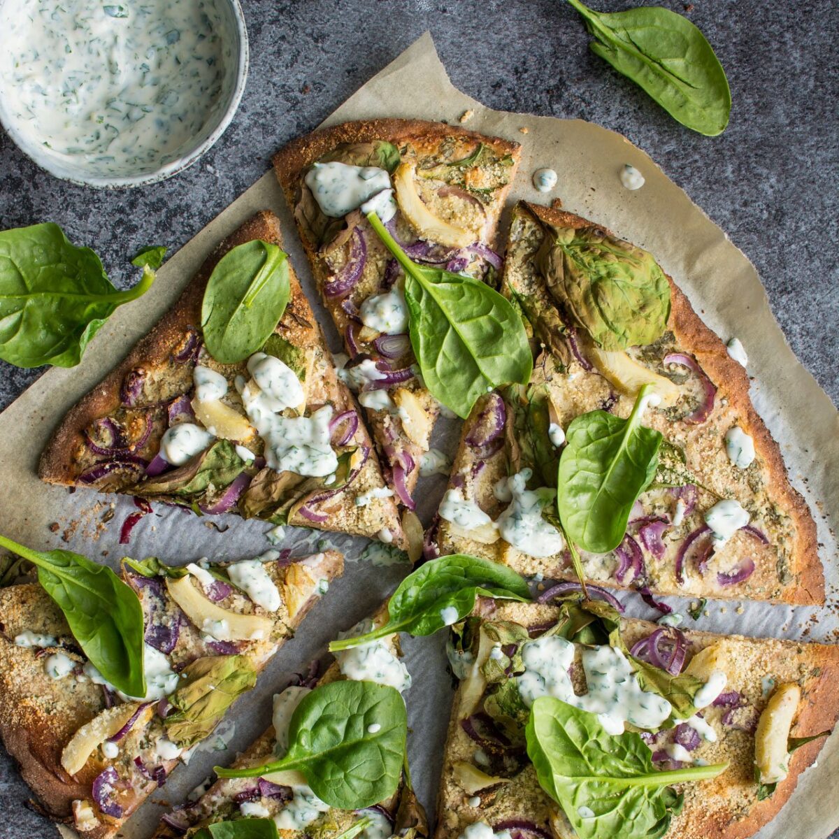 Vegan ranch pizza. This wholewheat base is topped with the creamiest vegan ranch sauce and topped with lots of great vegetables for a fun alternative to the regular tomato base.