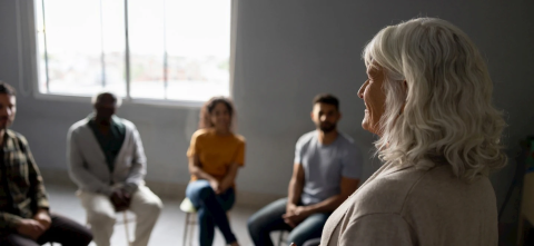 A group of people sitting in a circle